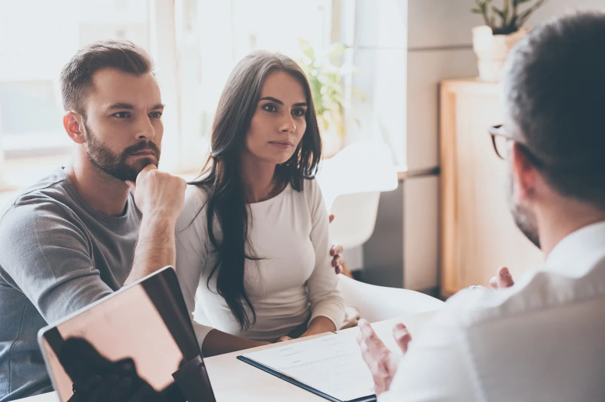 couple meeting with financial advisor